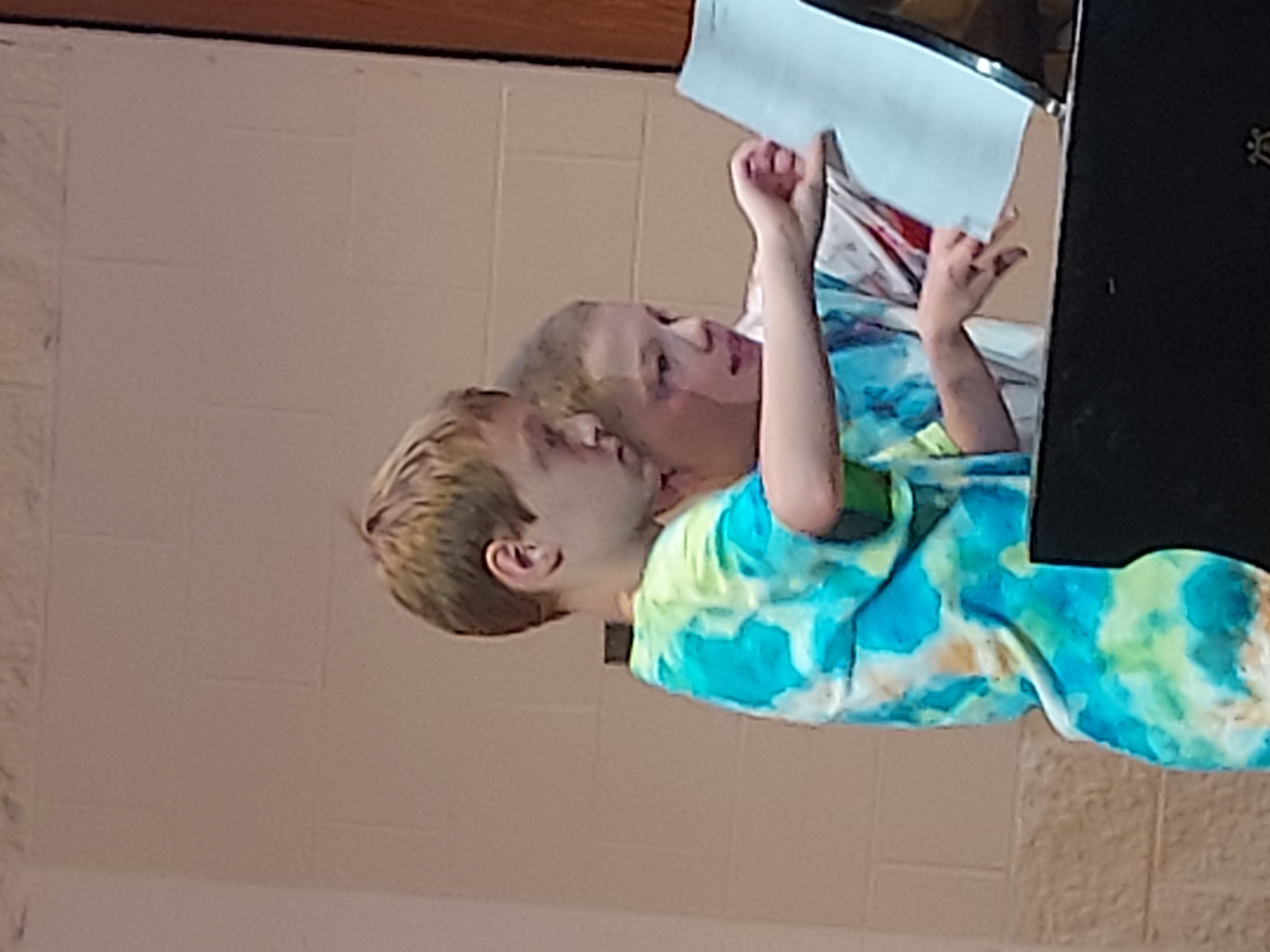 Picture of two boys playing the piano as a duet